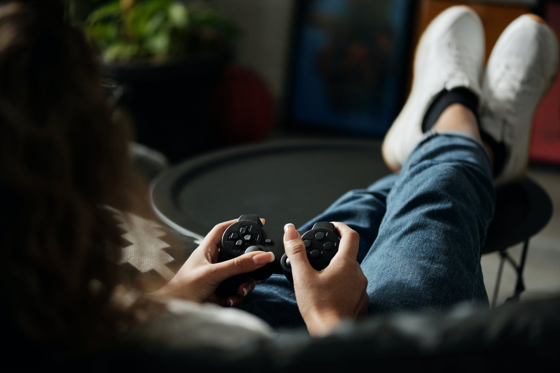 view of a person holding game controller