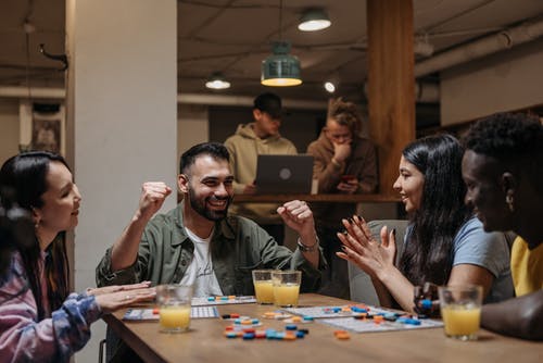 Group of people having fun and playing games