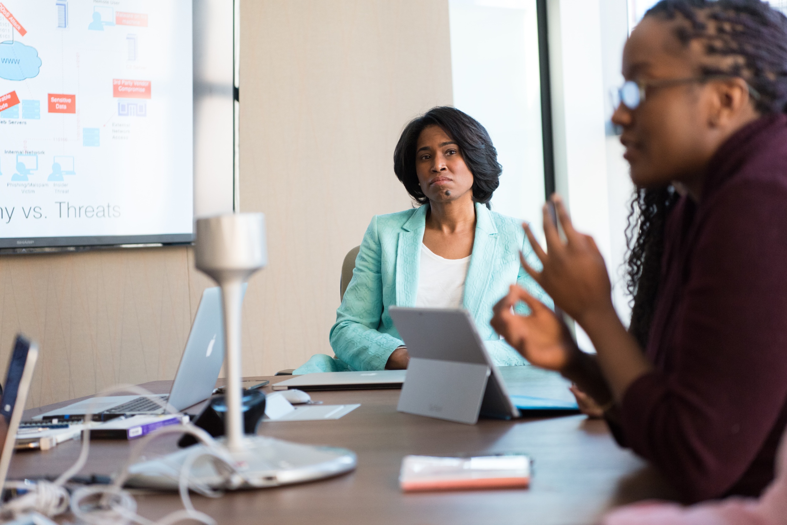 Woman looking bothered at the meeting