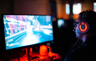 A man playing computer video game